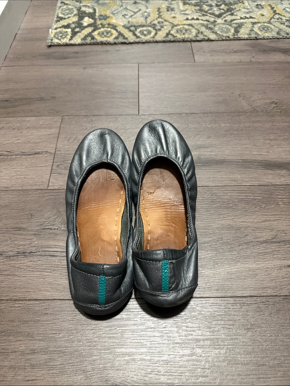 Tieks Black Leather Flats with Teal Heel Stitch